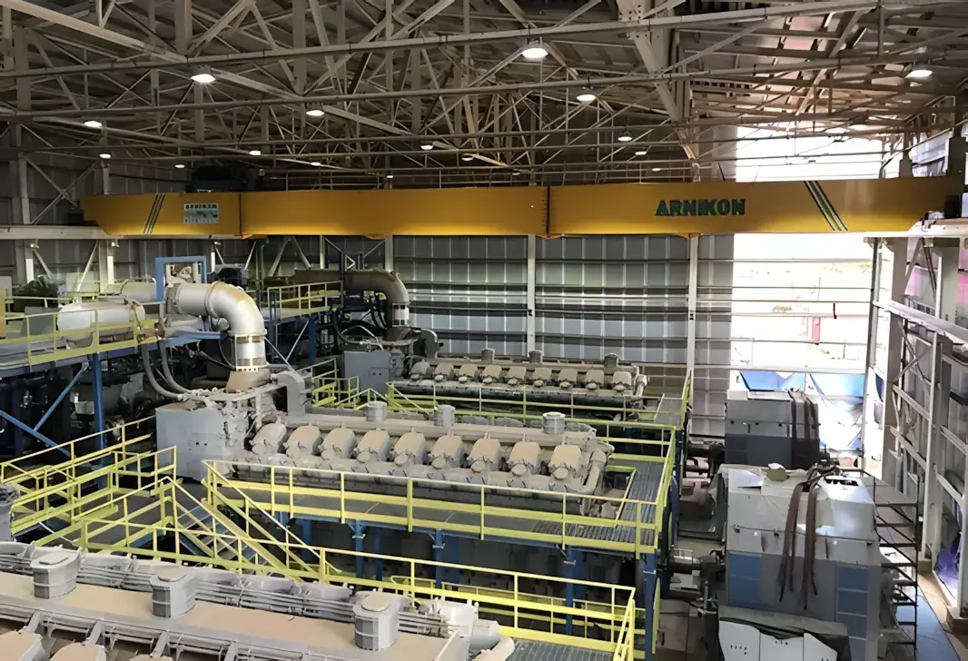 Steel roof trusses, platforms and overhead crane inside a power plant